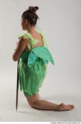 KATERINA KNNELING POSE WITH SWORD